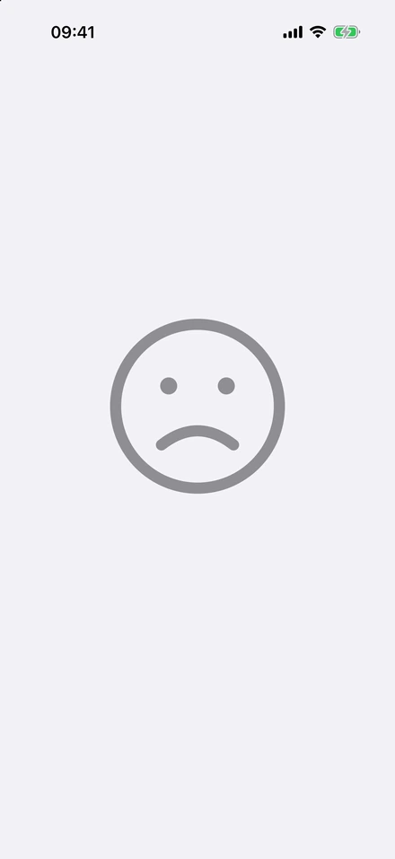Lo schermo di un iPhone con una faccina triste